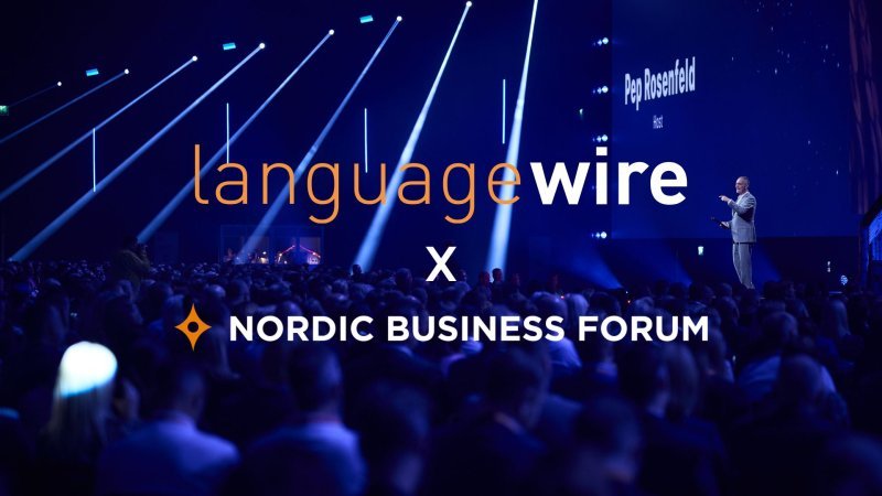 Ilmoituksen kuvituskuva, jossa LanguageWire x Nordic Business Forum -teksti tapahtumakuvan päällä